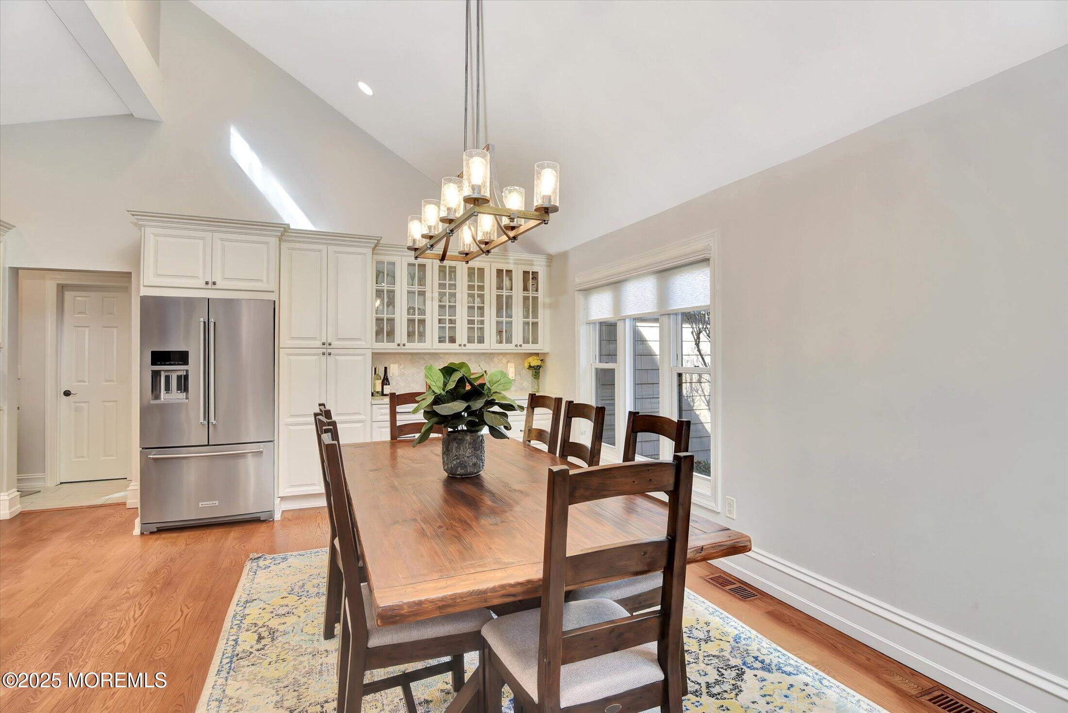 2 Lyndon Lane Howell, NJ 07731 - Photo 20 of 51 a view of a dining room with furniture window and wooden floor