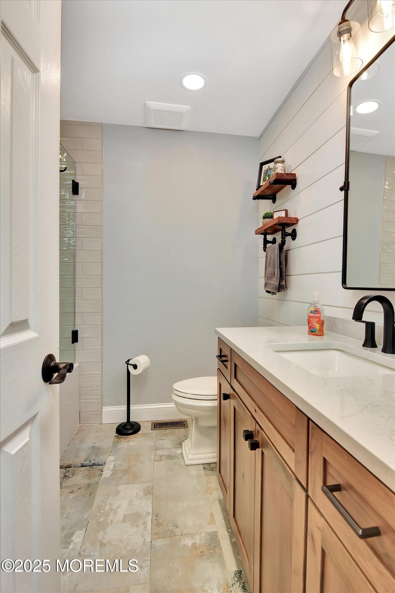 2 Lyndon Lane Howell, NJ 07731 - Photo 21 of 51 a bathroom with a sink toilet and shower