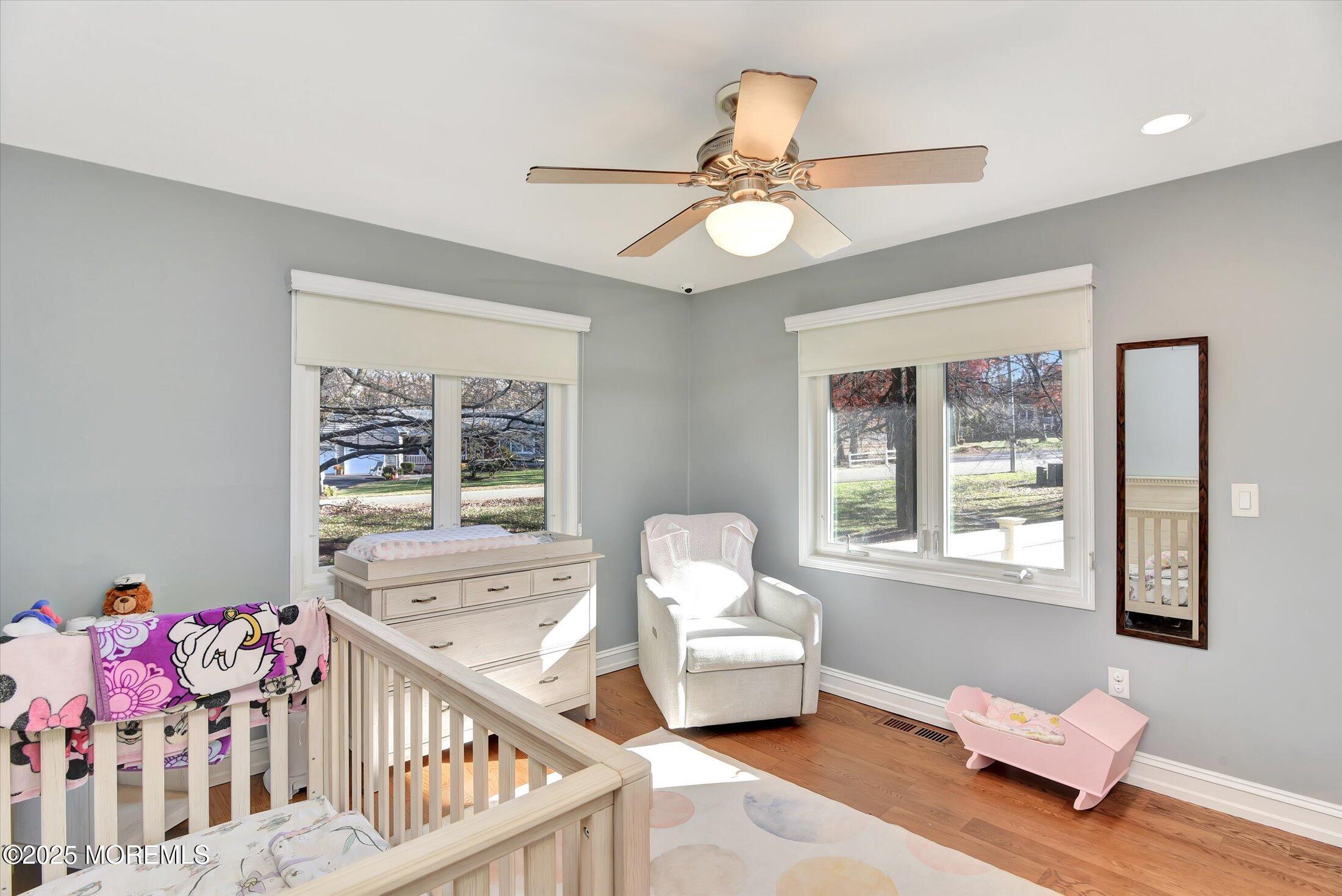 2 Lyndon Lane Howell, NJ 07731 - Photo 30 of 51 a bedroom with furniture and a window