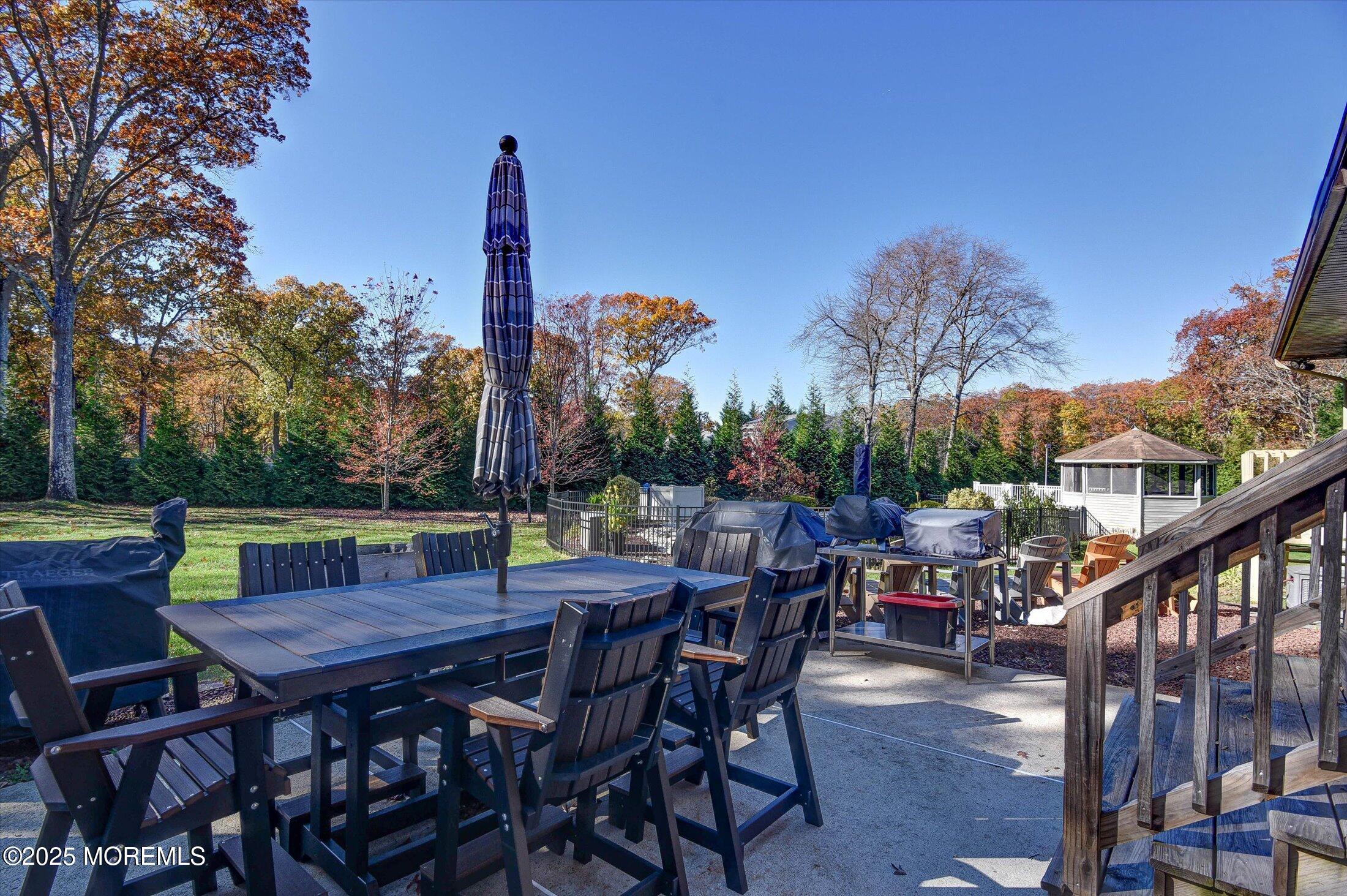 2 Lyndon Lane Howell, NJ 07731 - Photo 39 of 51 a view of an outside dining space with furniture
