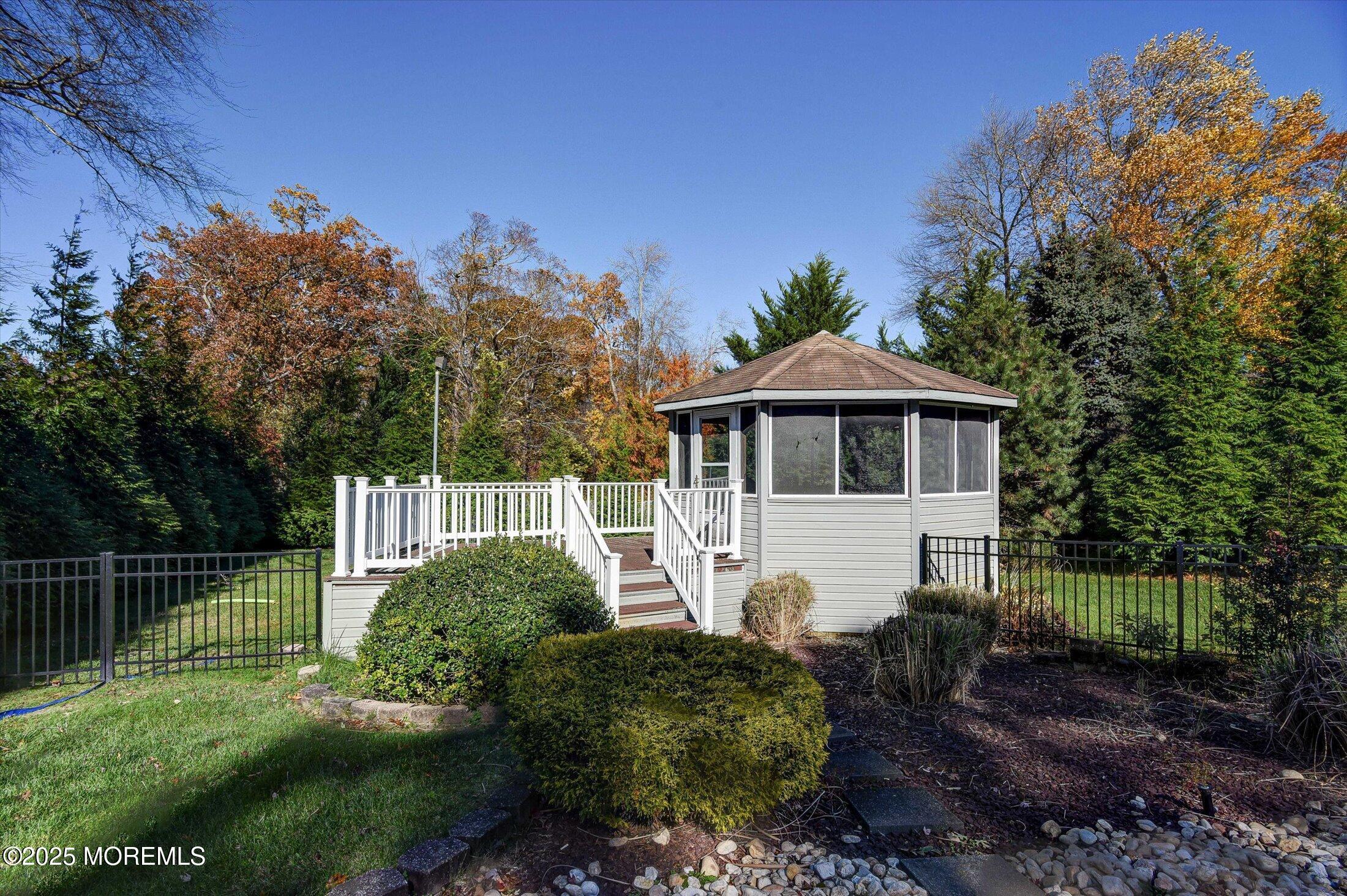 2 Lyndon Lane Howell, NJ 07731 - Photo 48 of 51 a front view of a house with a yard