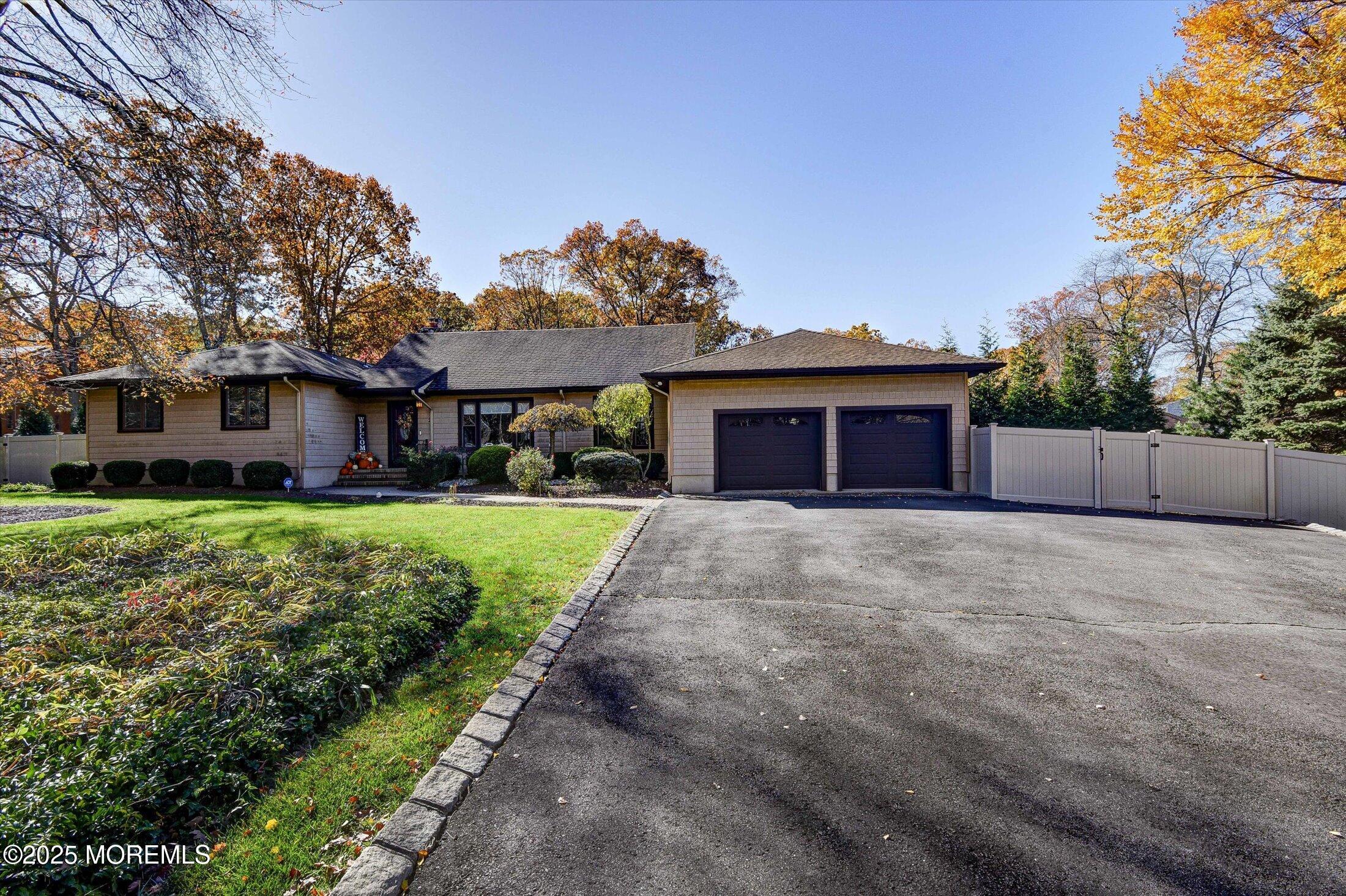 2 Lyndon Lane Howell, NJ 07731 - Photo 5 of 51 a front view of house with yard and green space