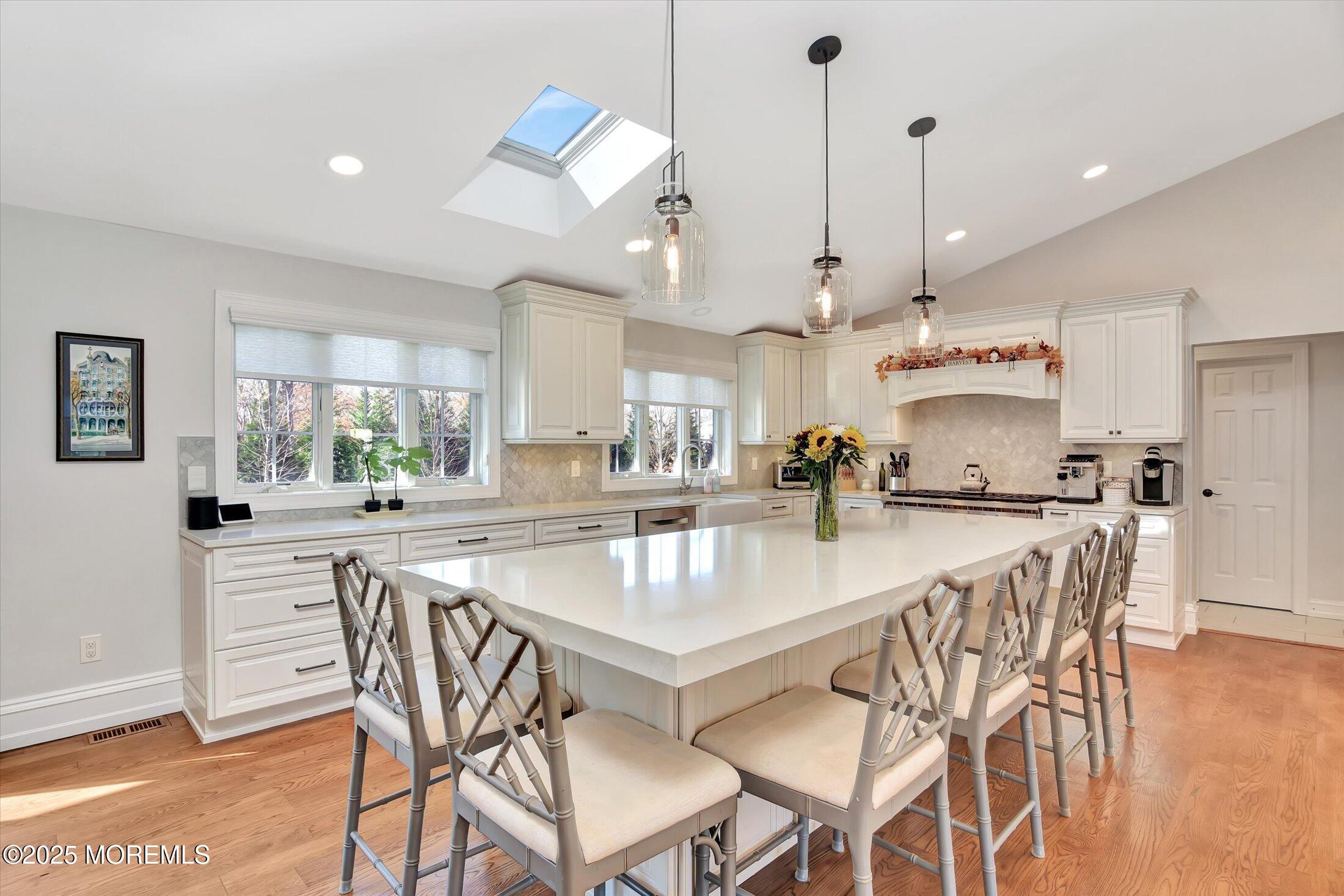 2 Lyndon Lane Howell, NJ 07731 - Photo 10 of 51 a kitchen with a table and chairs in it