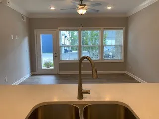 a kitchen with a sink and a window
