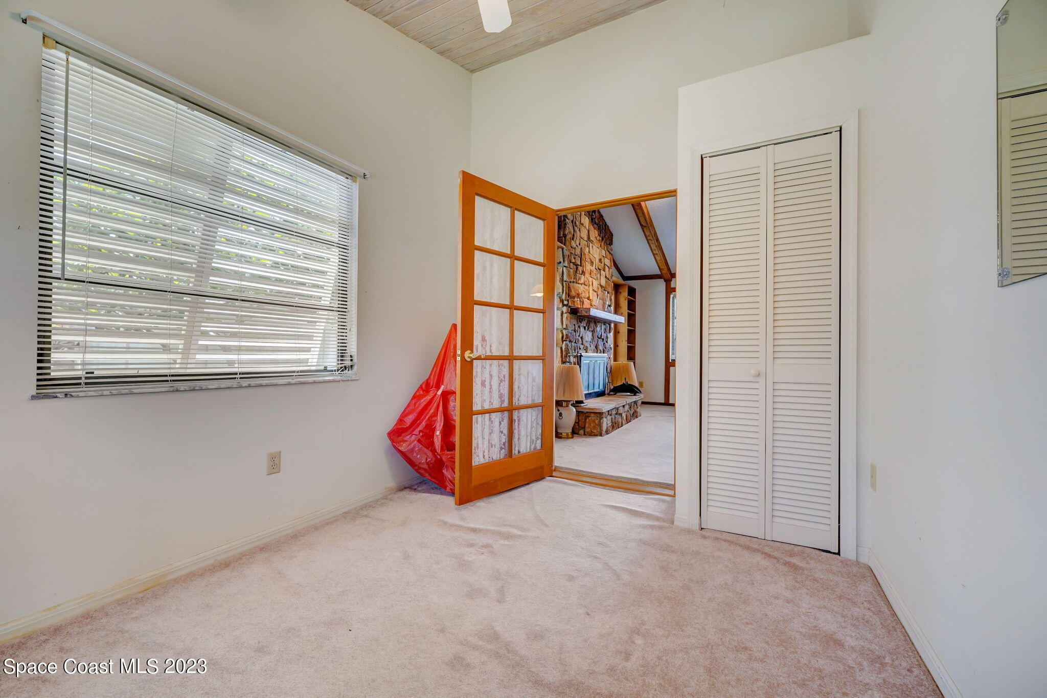 1250 Faulkingham Road Merritt Island, FL 32952 - Photo 6 of 10 a view of an empty room with a window