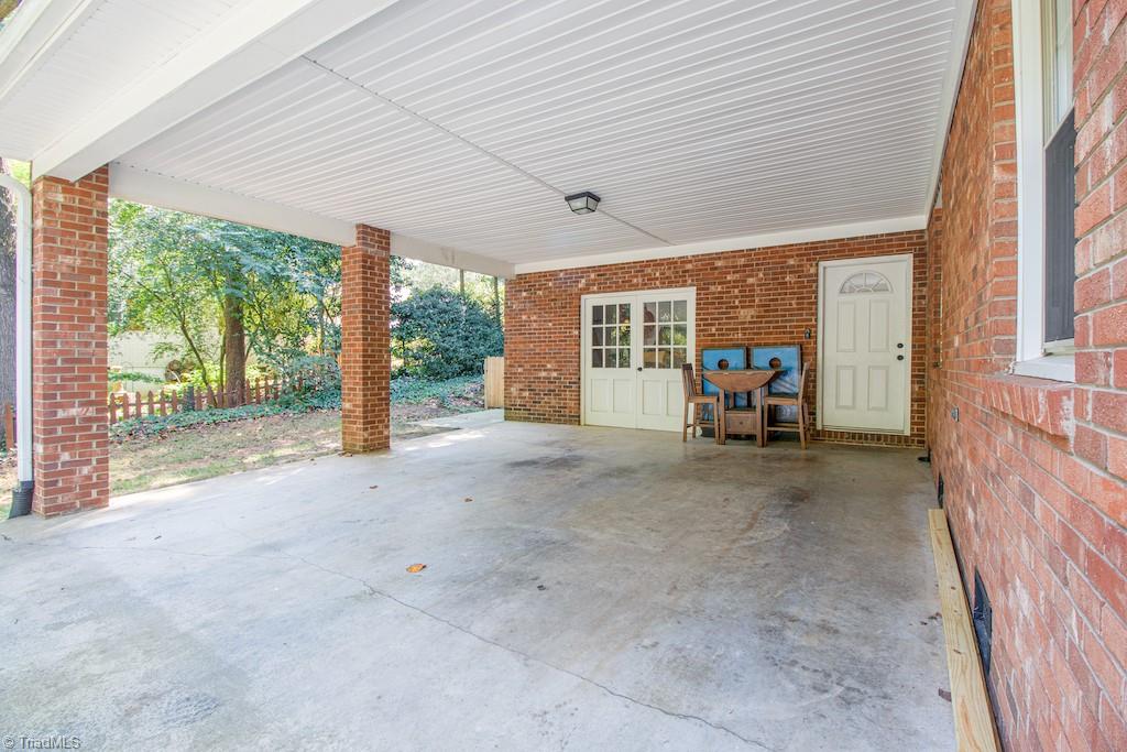 3701 Hobbs Road Greensboro, NC 27410 - Photo 4 of 35 Covered 2 car Carport
