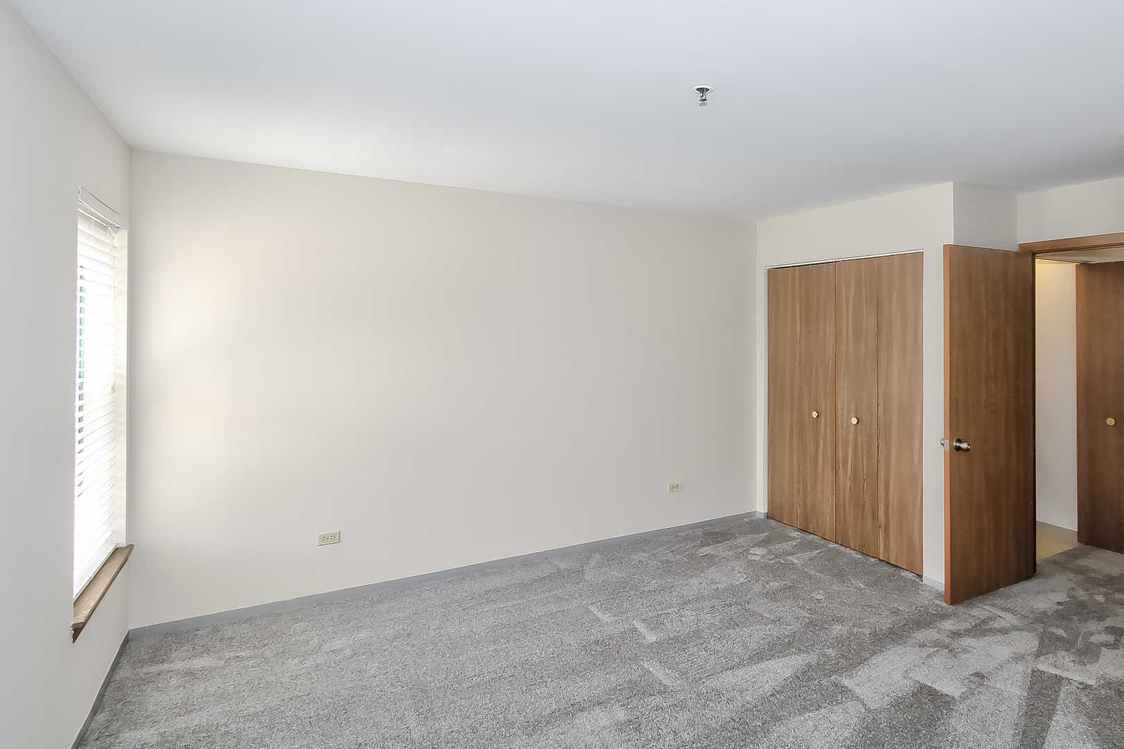 3255 Kirchoff Road, Unit 208 Rolling Meadows, IL 60008 - Photo 16 of 21 a view of an empty room