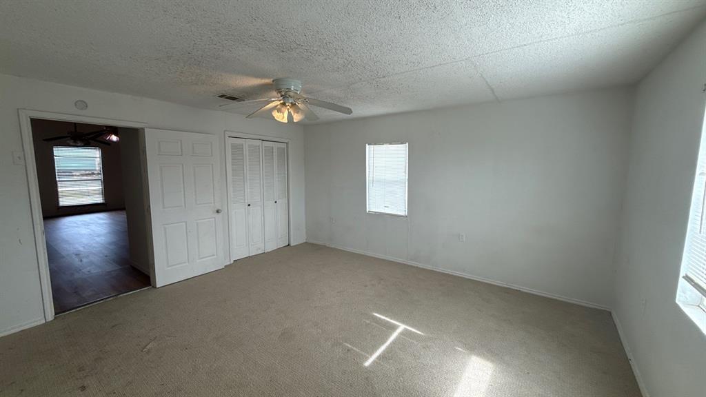 201 East Hubbard Road Josephine, TX 75173 - Photo 17 of 23 wooden floor in an empty room with a window