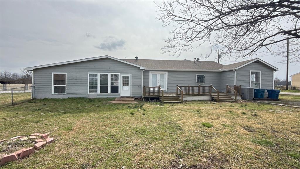 201 East Hubbard Road Josephine, TX 75173 - Photo 21 of 23 a backyard of a house with table and chairs