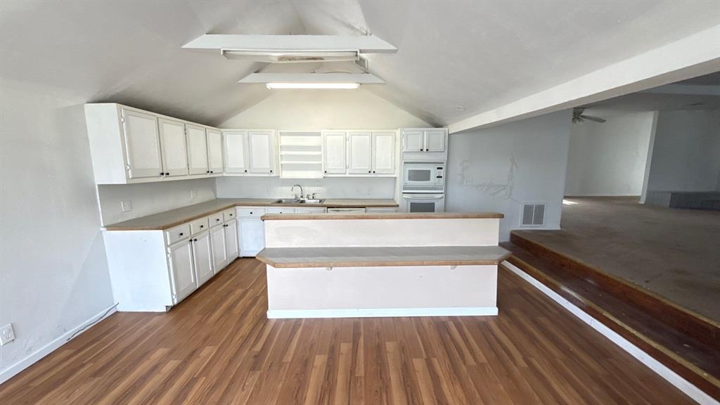 201 East Hubbard Road Josephine, TX 75173 - Photo 9 of 23 a large kitchen with cabinets