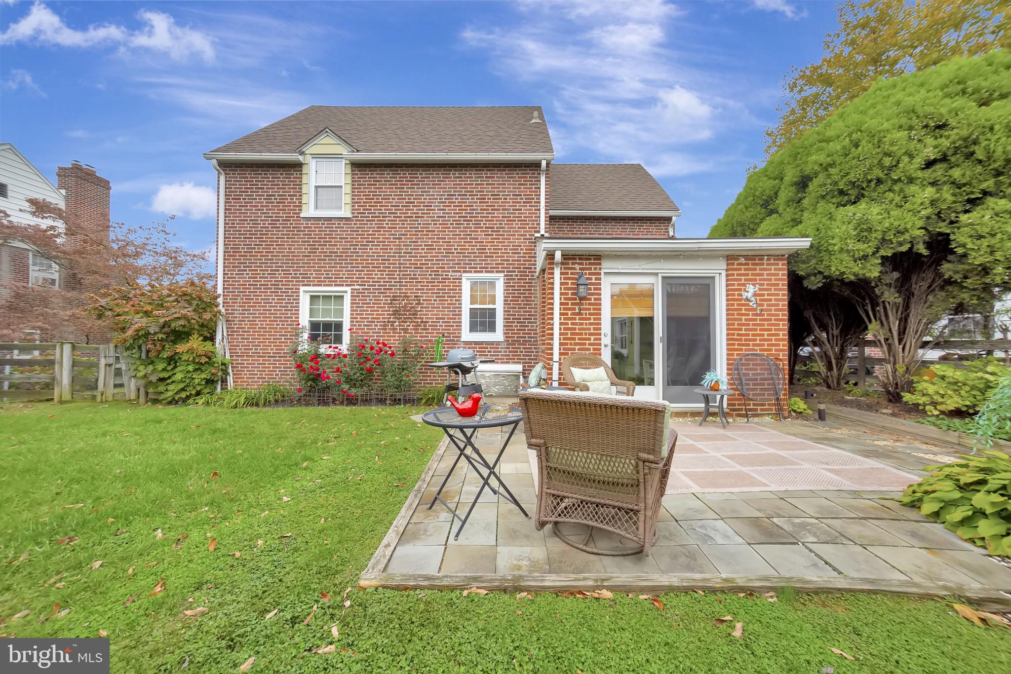 214 Claremont Road Springfield, PA 19064 - Photo 28 of 30 a view of a house with backyard sitting area and garden