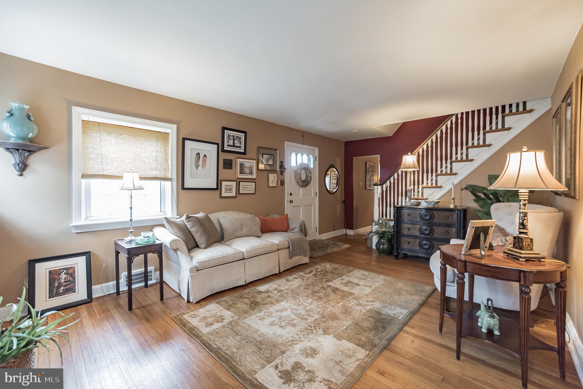 214 Claremont Road Springfield, PA 19064 - Photo 5 of 30 a living room with furniture and a wooden floor