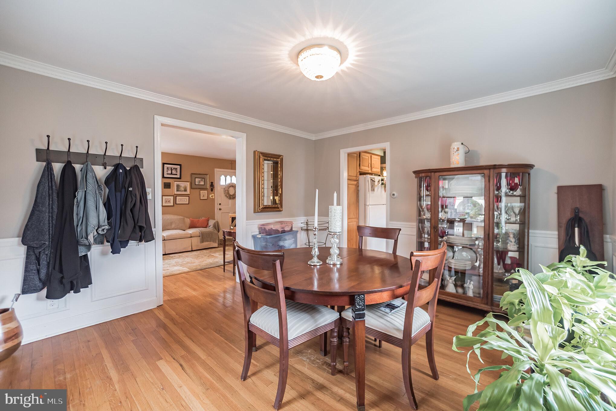 214 Claremont Road Springfield, PA 19064 - Photo 9 of 30 a dining room with furniture and wooden floor