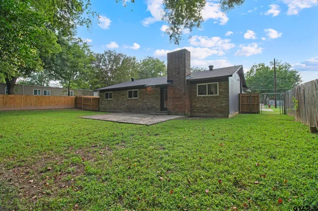a house view with a garden space