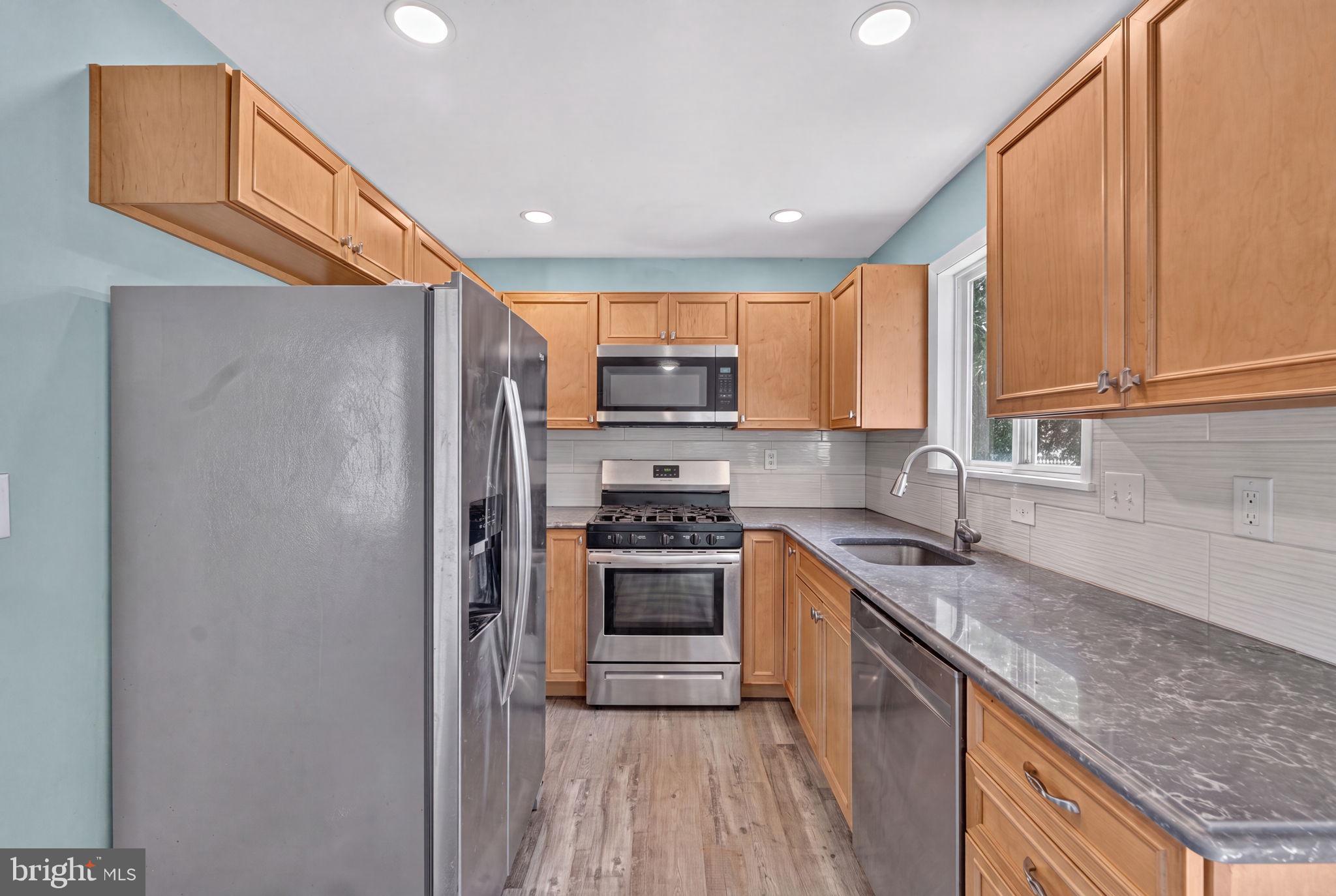 1301 Greentree Road Newark, DE 19713 - Photo 10 of 30 Modern kitchen with sleek finishes.
