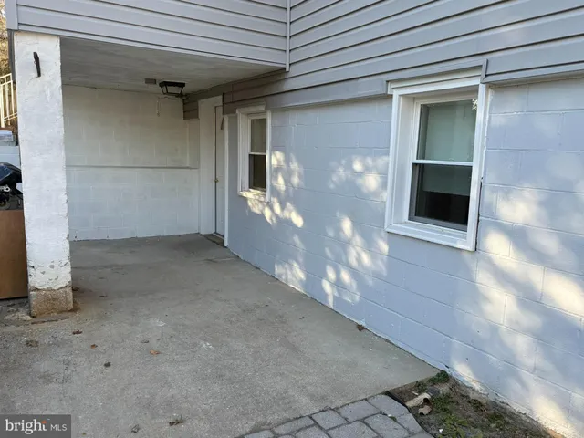 a view of a livingroom with wooden floor