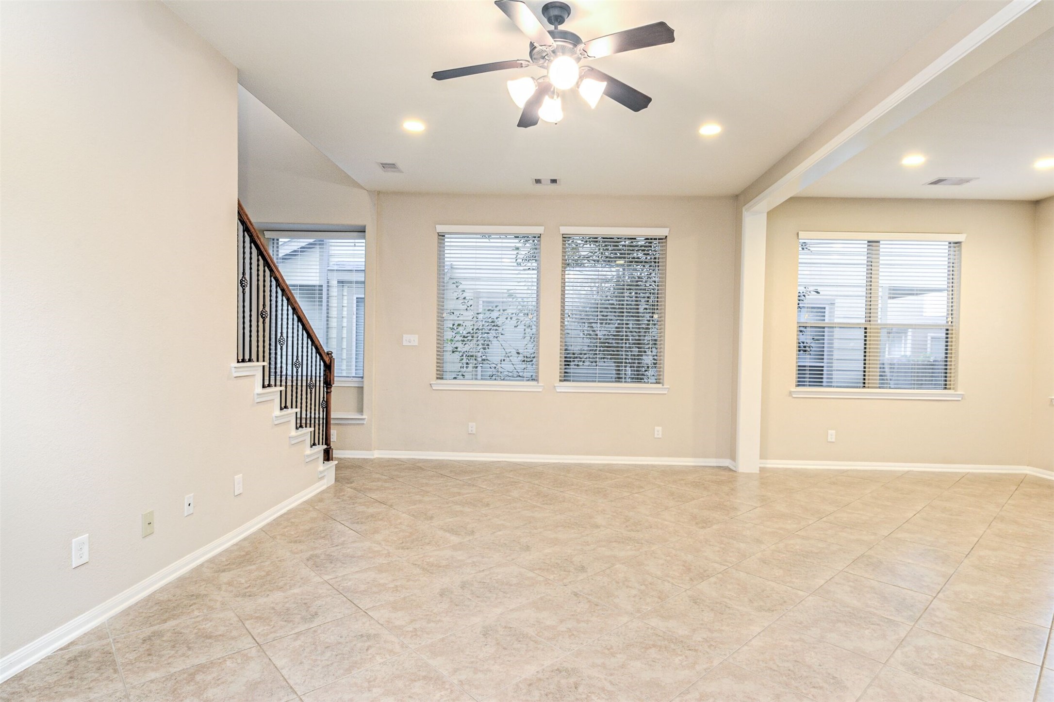 19 Cheswood Manor Court The Woodlands, TX 77382 - Photo 11 of 37 a view of an empty room with a window