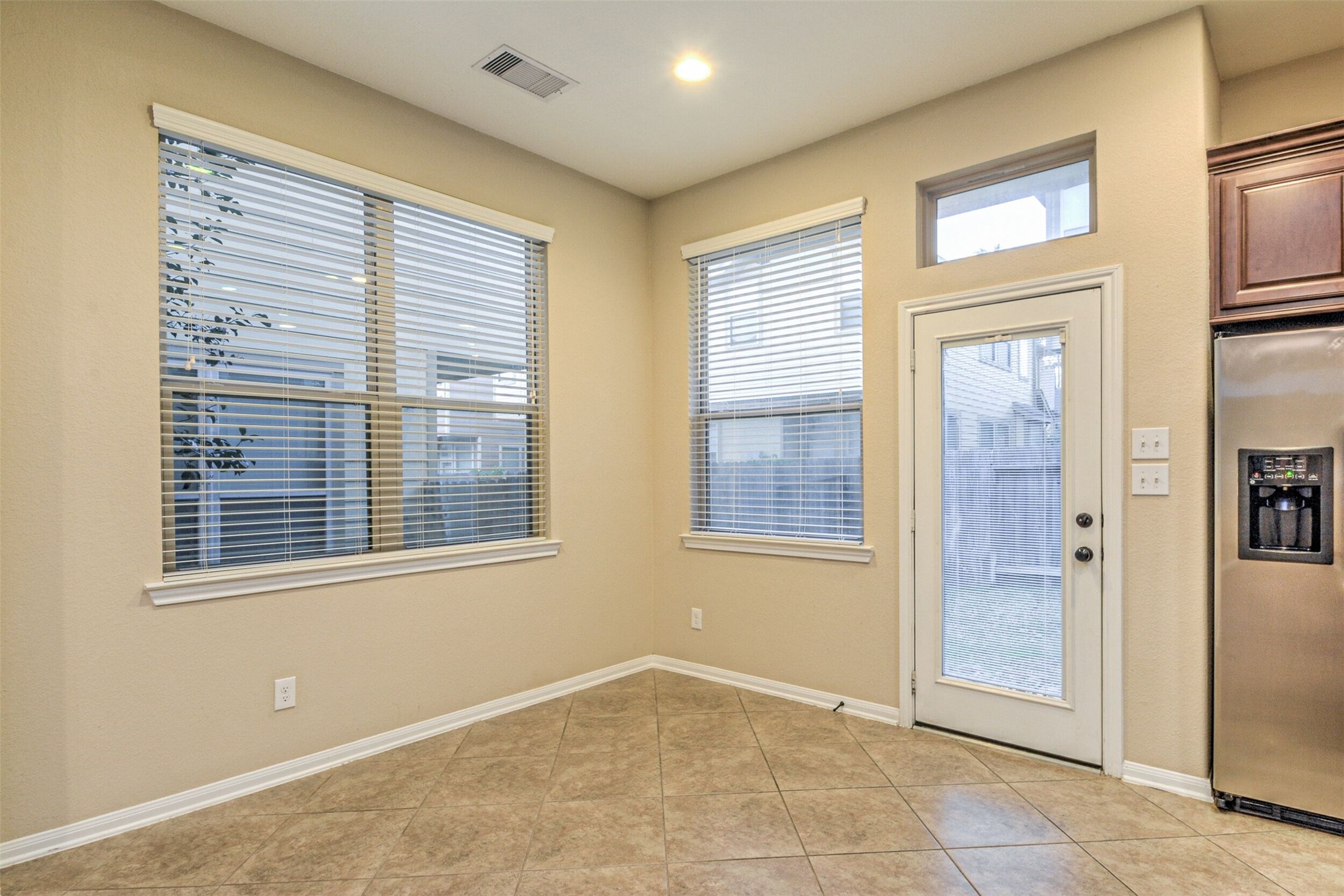 19 Cheswood Manor Court The Woodlands, TX 77382 - Photo 15 of 37 a view of an empty room with a window