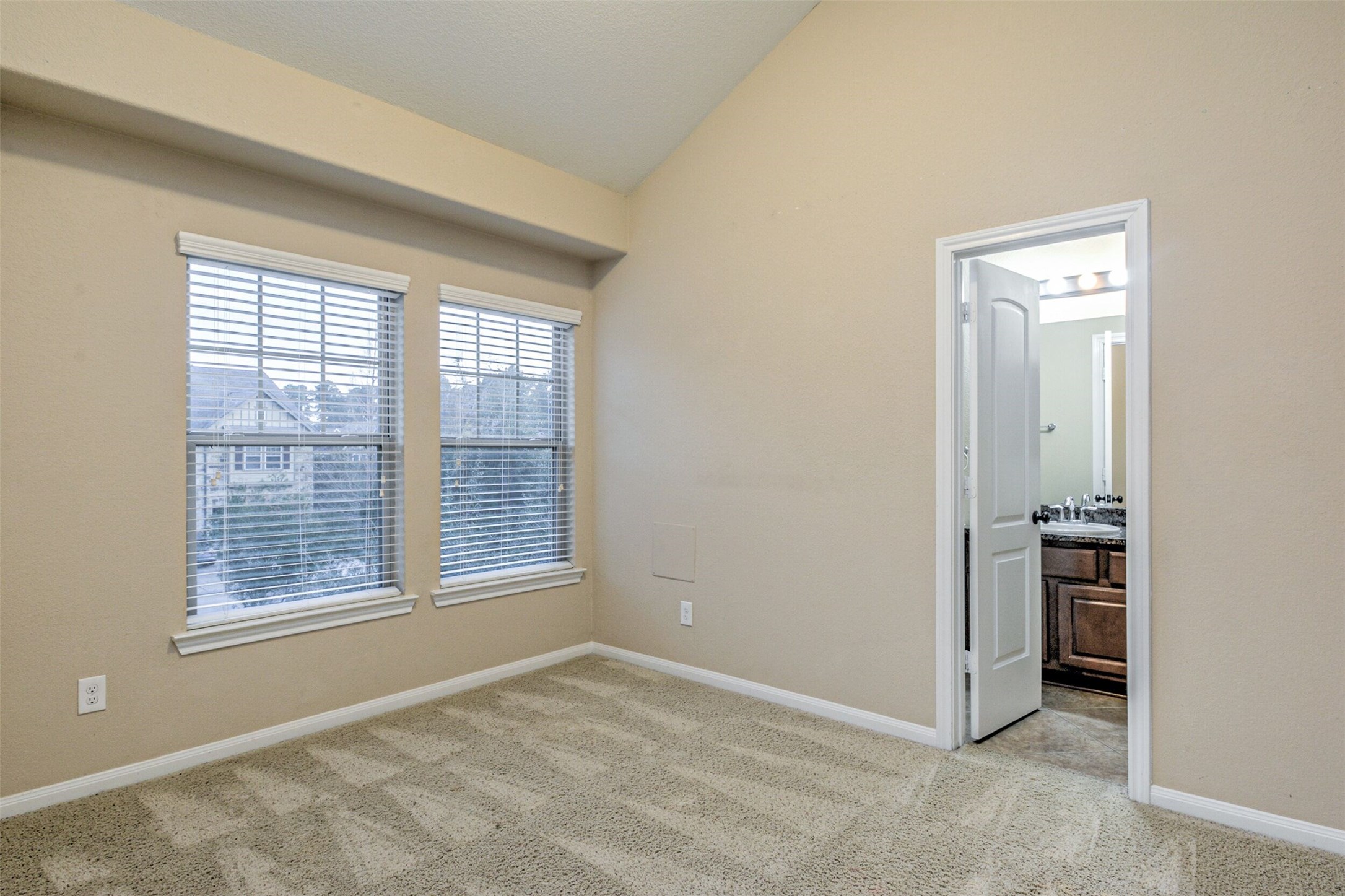 19 Cheswood Manor Court The Woodlands, TX 77382 - Photo 25 of 37 an empty room with windows and closet