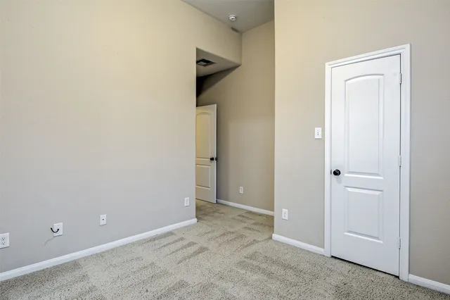 an empty room with a door