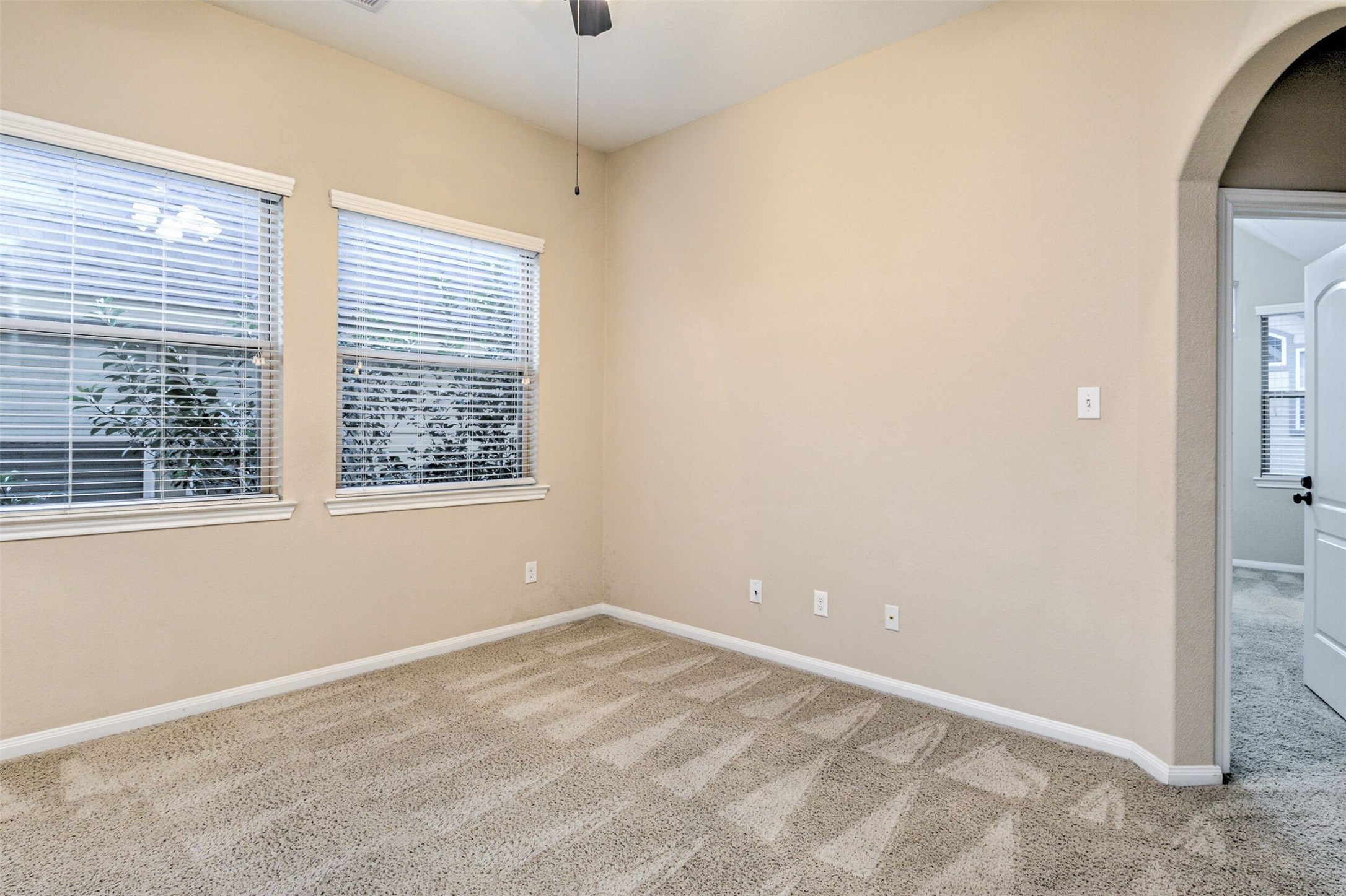 19 Cheswood Manor Court The Woodlands, TX 77382 - Photo 27 of 37 an empty room with a window