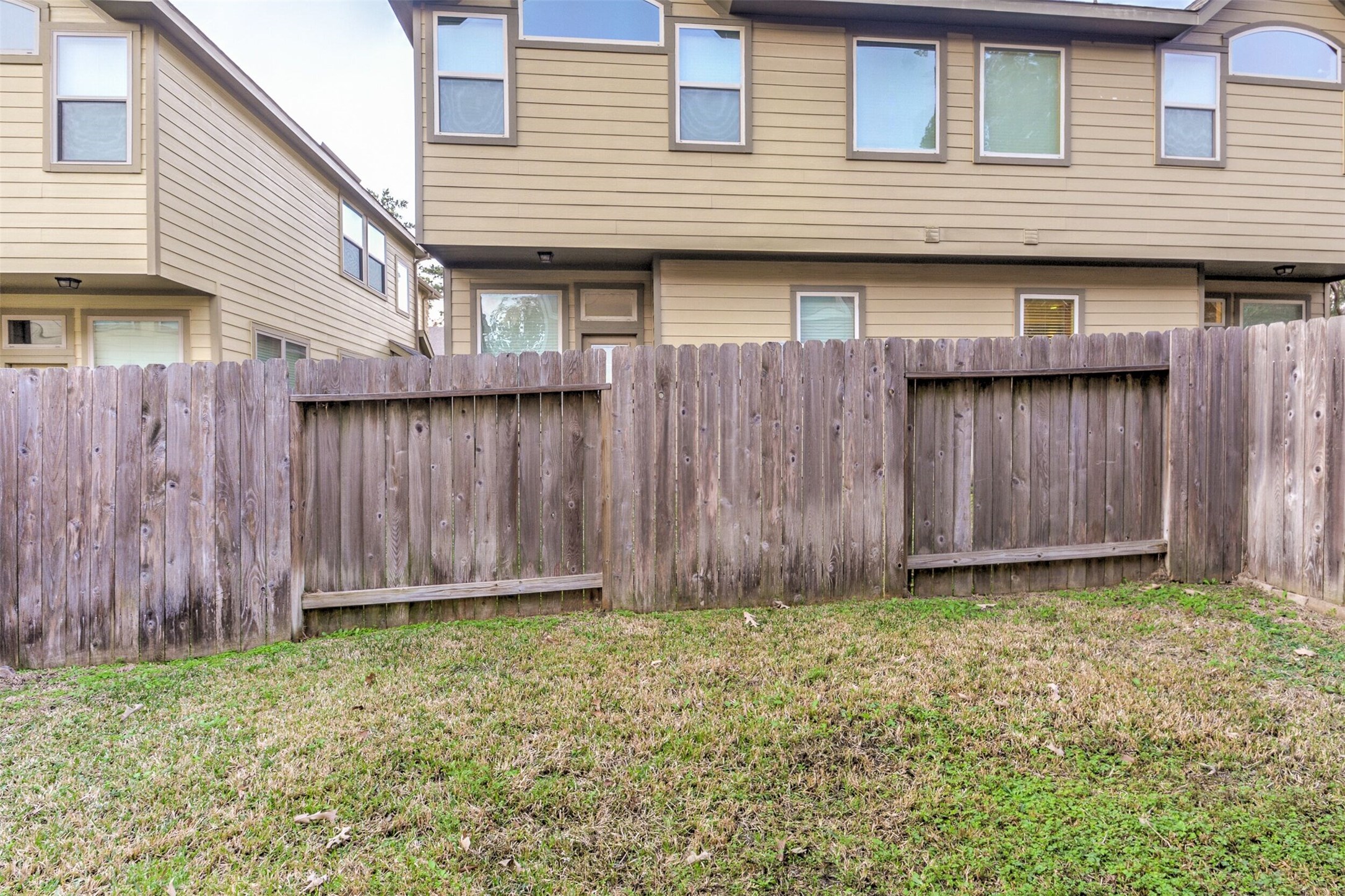 19 Cheswood Manor Court The Woodlands, TX 77382 - Photo 34 of 37 a view of a backyard