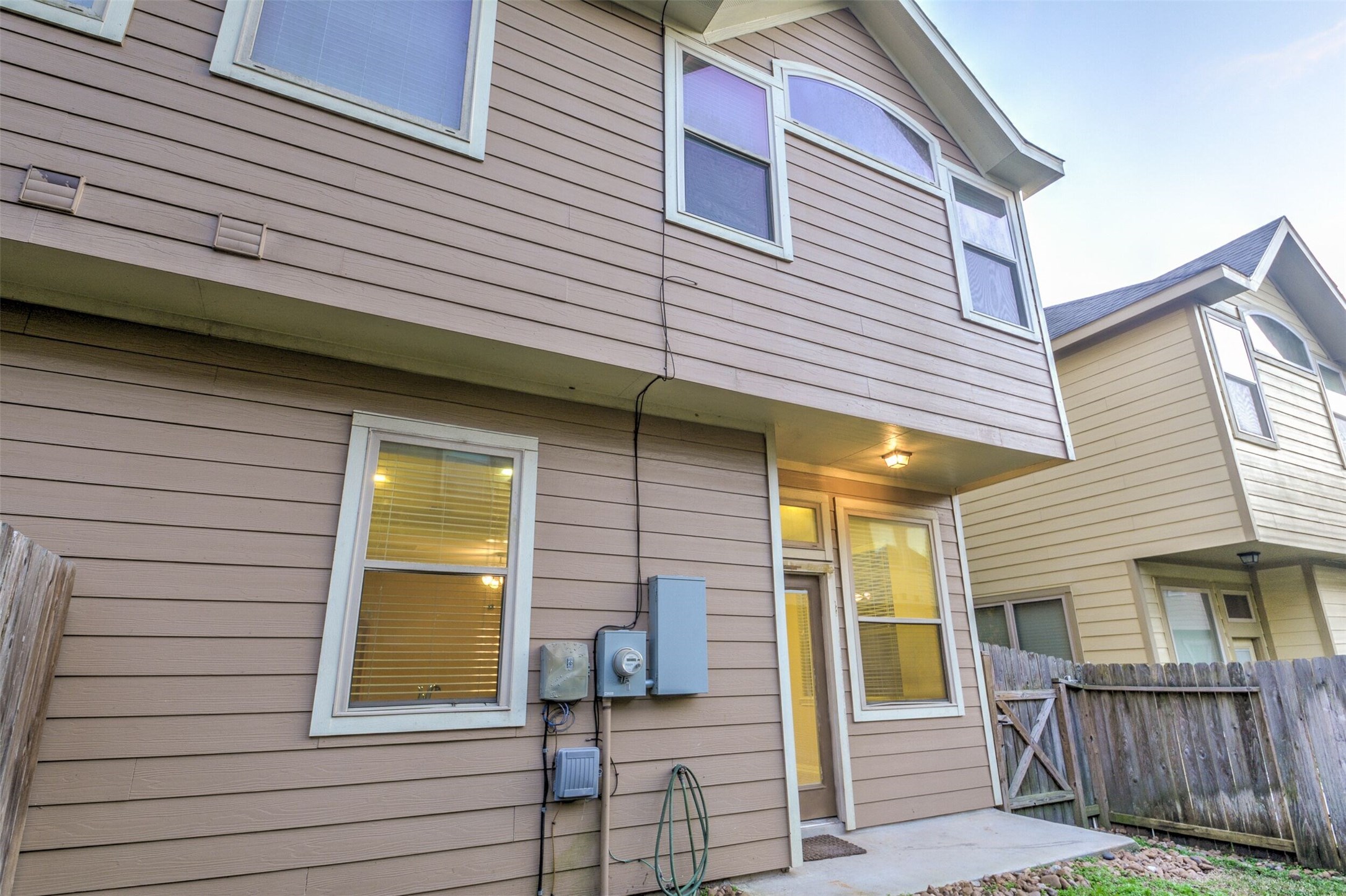 19 Cheswood Manor Court The Woodlands, TX 77382 - Photo 36 of 37 a view of house with a window and wooden fence