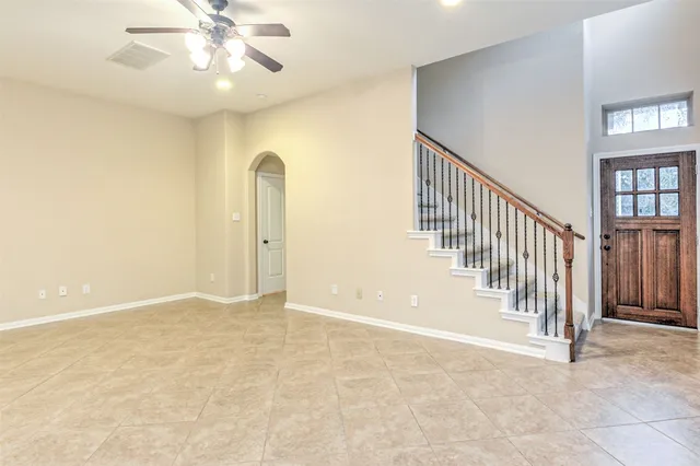 en view interior of a house with an entryway and stairs