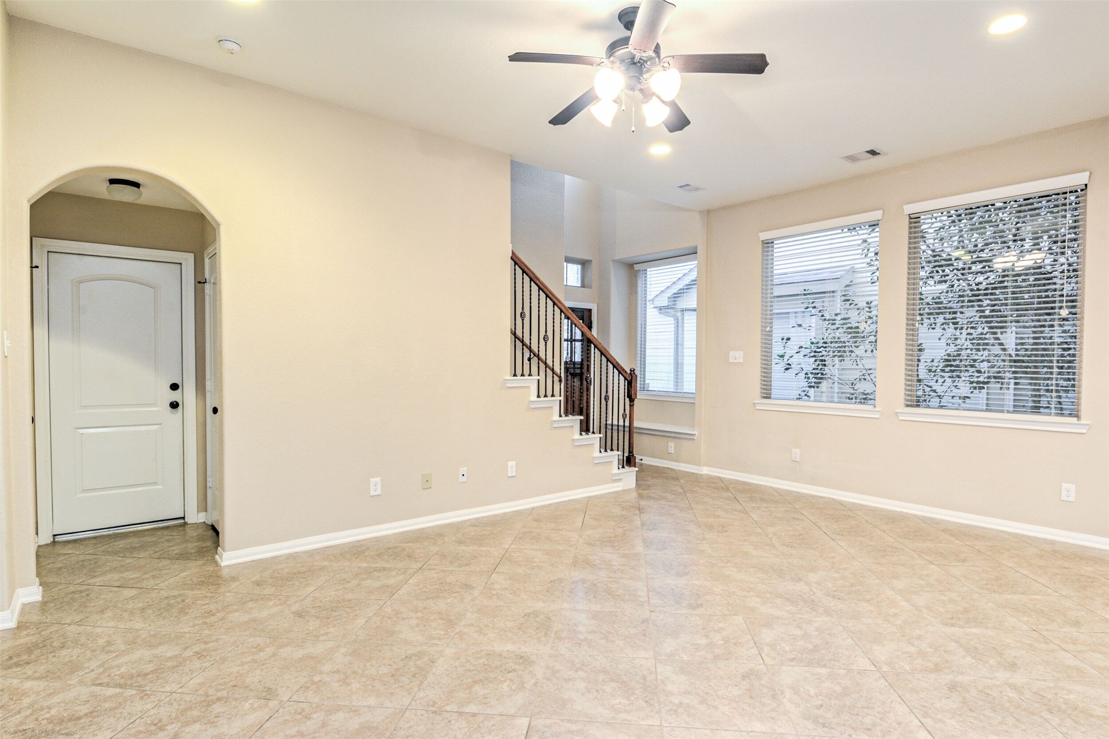 19 Cheswood Manor Court The Woodlands, TX 77382 - Photo 10 of 37 a view of an empty room with a window