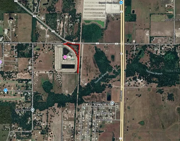 an aerial view of houses and roads