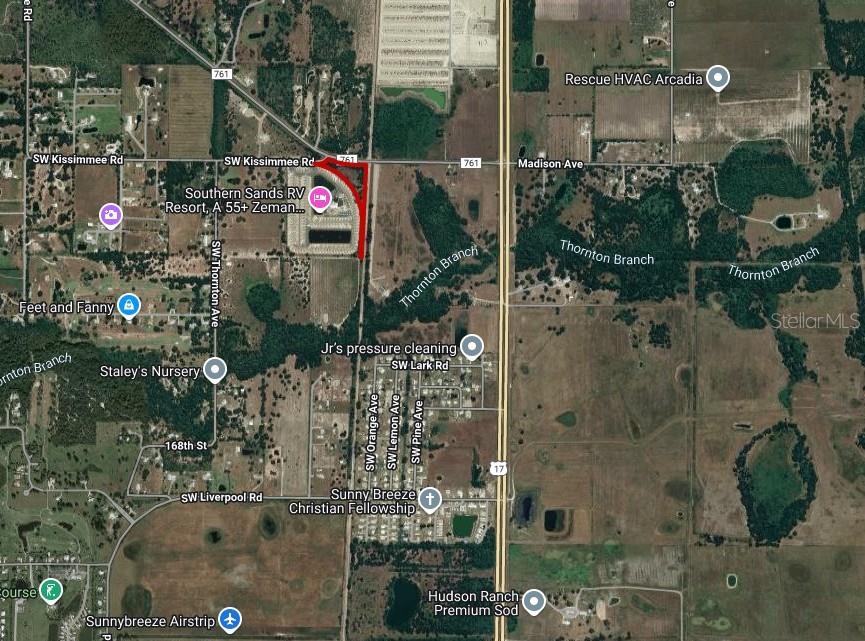 761 Southwest Co Road Arcadia, FL 34269 - Photo 4 of 5 an aerial view of houses and roads