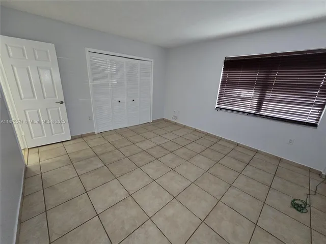 a view of a room and window