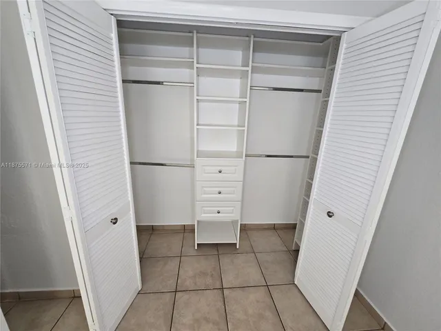 a view of a porch with seating space