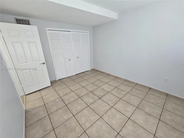 a view of a room with a bench