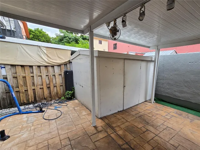 a view of an empty room and window