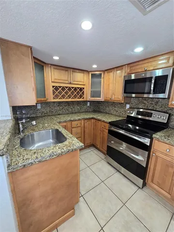 a view of a room & utility room