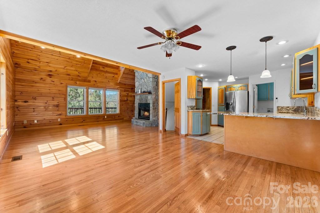 44 Elliston Court Sylva, NC 28779 - Photo 11 of 44 a view of a living room and kitchen with stainless steel appliances