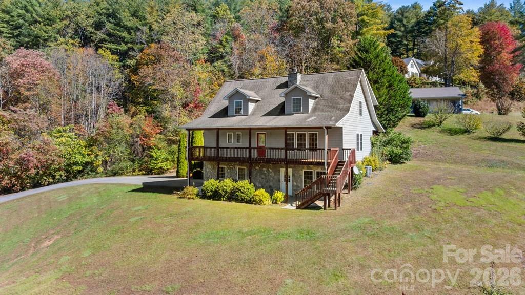 44 Elliston Court Sylva, NC 28779 - Photo 2 of 44 front view of a house with yard and staircase