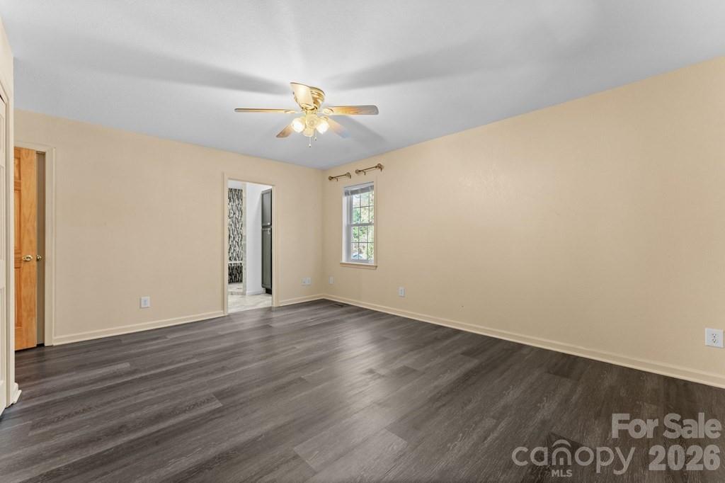 44 Elliston Court Sylva, NC 28779 - Photo 21 of 44 a view of an empty room with wooden floor and a window