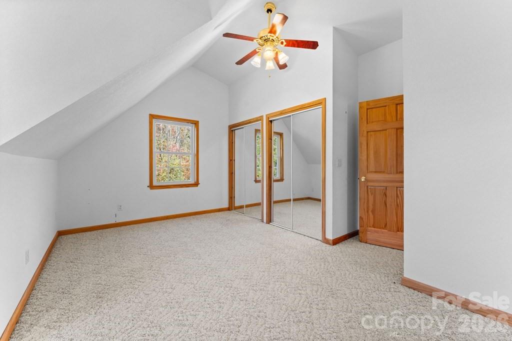 44 Elliston Court Sylva, NC 28779 - Photo 23 of 44 an empty room with windows and cabinet