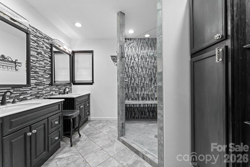 44 Elliston Court Sylva, NC 28779 - Photo 30 of 44 a bathroom with a shower and a sink