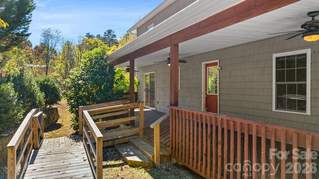 44 Elliston Court Sylva, NC 28779 - Photo 4 of 44 a view of a balcony with wooden floor and outdoor space