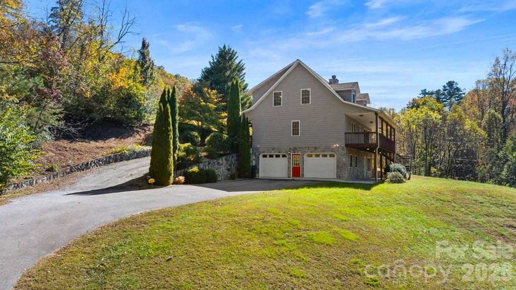 44 Elliston Court Sylva, NC 28779 - Photo 5 of 44 a view of a house with a yard