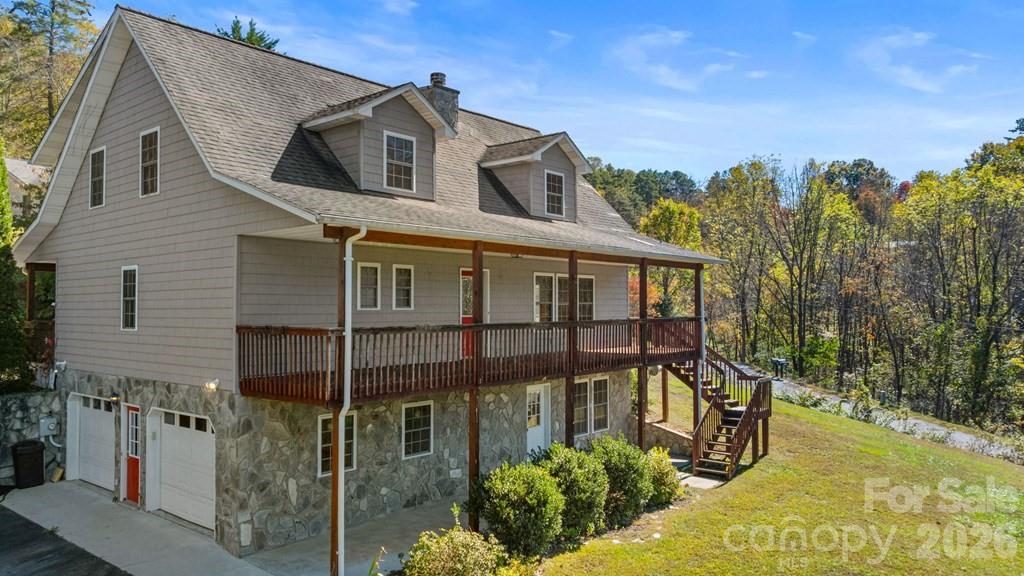 44 Elliston Court Sylva, NC 28779 - Photo 7 of 44 a front view of a house with garden