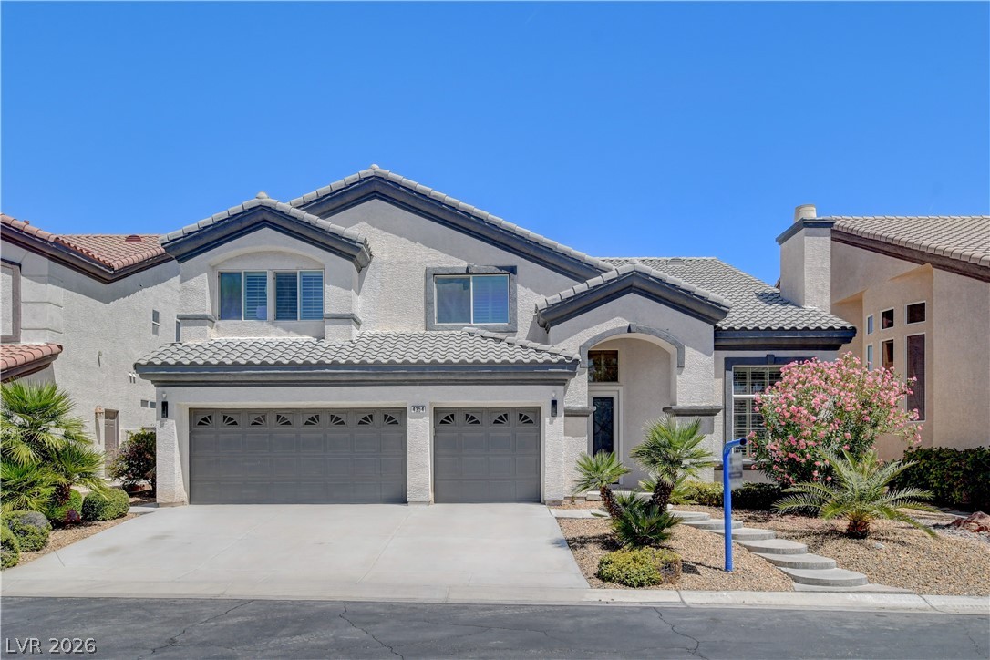 4354 Tall Tree Street Las Vegas, NV 89147 - Photo 1 of 67 This residence showcases a clean stucco exterior, an attached garage, and mature landscaping.