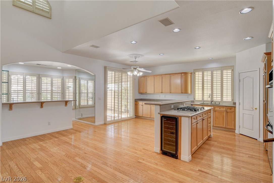 4354 Tall Tree Street Las Vegas, NV 89147 - Photo 23 of 67 This bright and open kitchen area features beautiful hardwood floors and plenty of natural light.