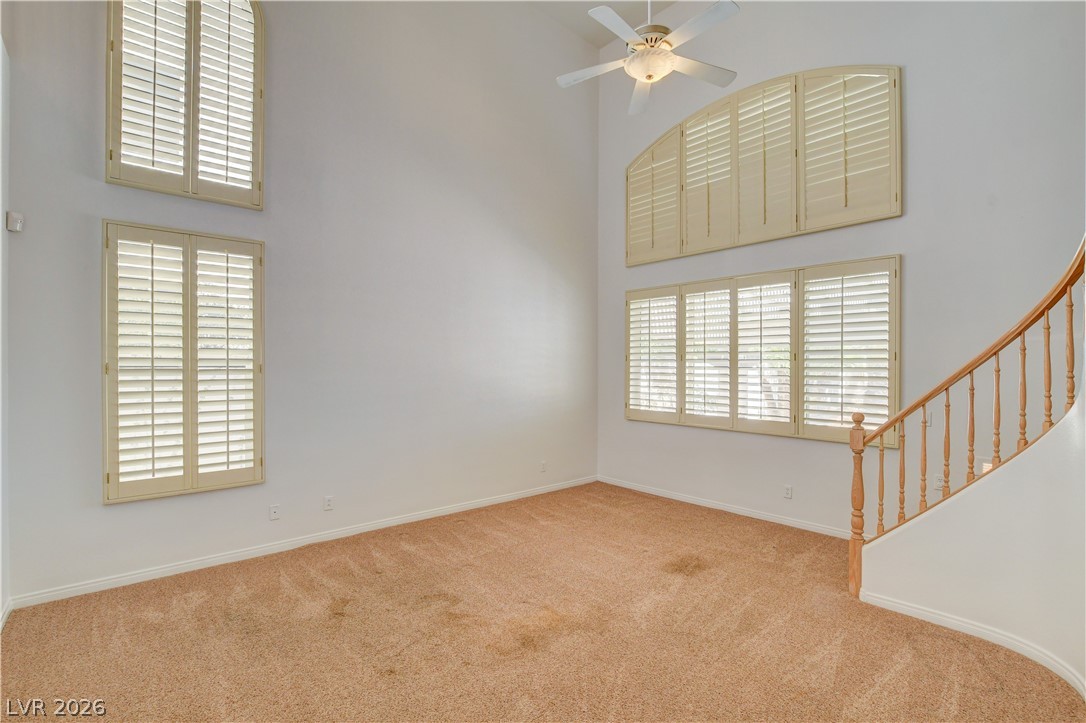 4354 Tall Tree Street Las Vegas, NV 89147 - Photo 29 of 67 This airy living space features abundant natural light, creating an inviting atmosphere for everyday living.