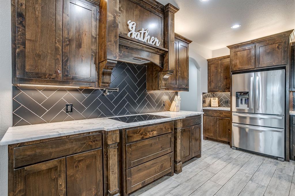 8895 Hutcheson Hill Road Springtown, TX 76082 - Photo 13 of 40 Pot Filler over Cooktop