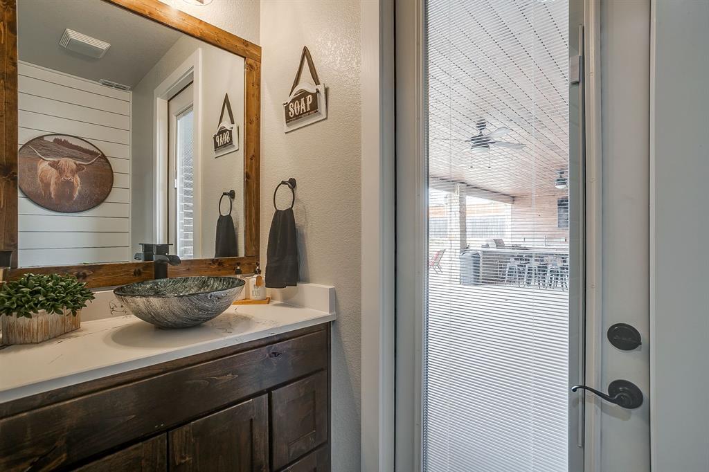 8895 Hutcheson Hill Road Springtown, TX 76082 - Photo 24 of 40 1/2 Bath that has entrance from back porch