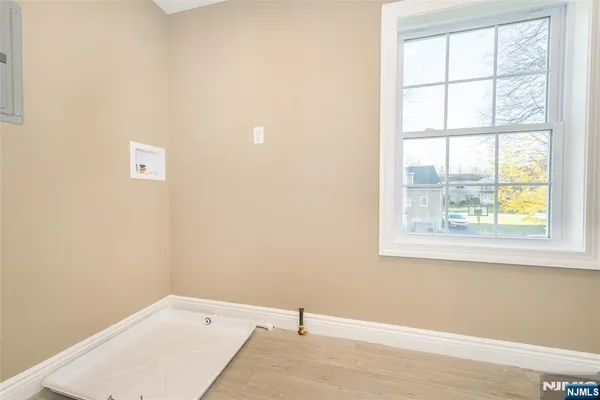 a room with a window and a table